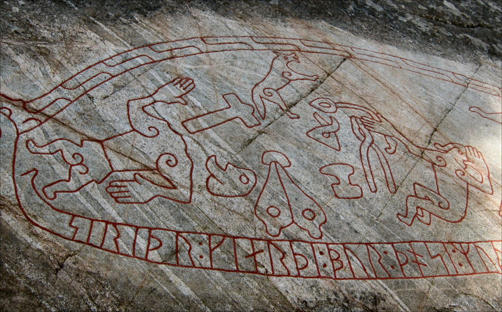 Runic memorial stone at Ramsund, Sweden, carved with scenes from the Sigurd legend, including the dragon-slaying.